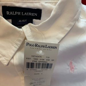 White sleeveless infant shirt pink polo logo